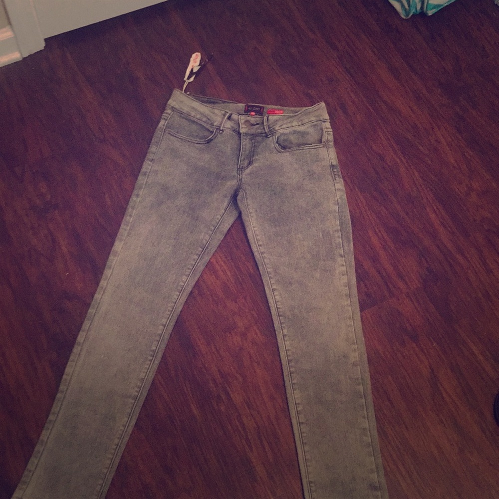 Grey and faded detailed jeans